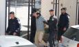 FOTO Pogledajte privođenje ubojice: Policija ga vezanog odvela u kombi